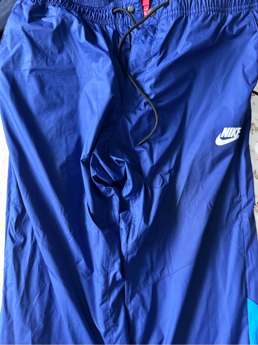Nike Blue Athletic Track Pants with Red Logo Tag
